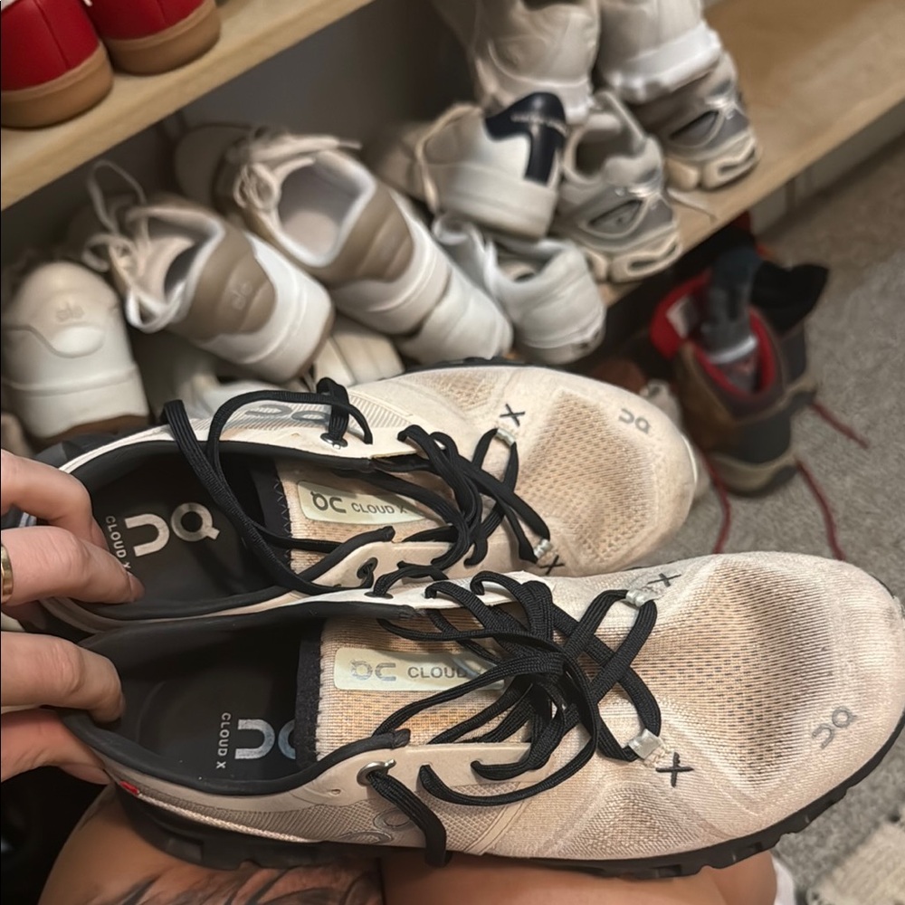 On Running Beige and Black Athletic Shoes